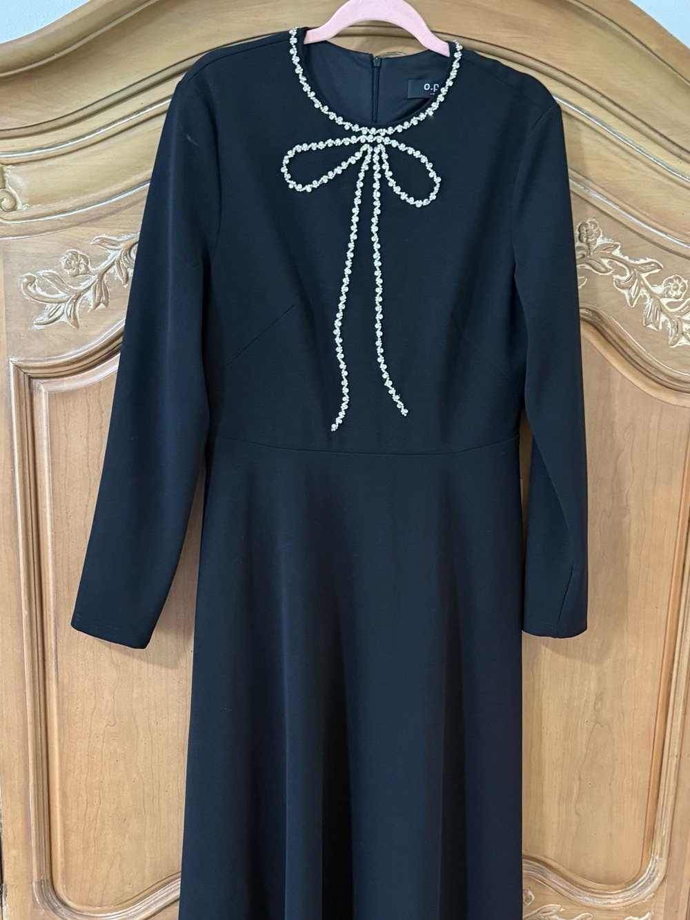O.P.T. NWOT black midi dress with sleeves and rhinestone bow detail size XL